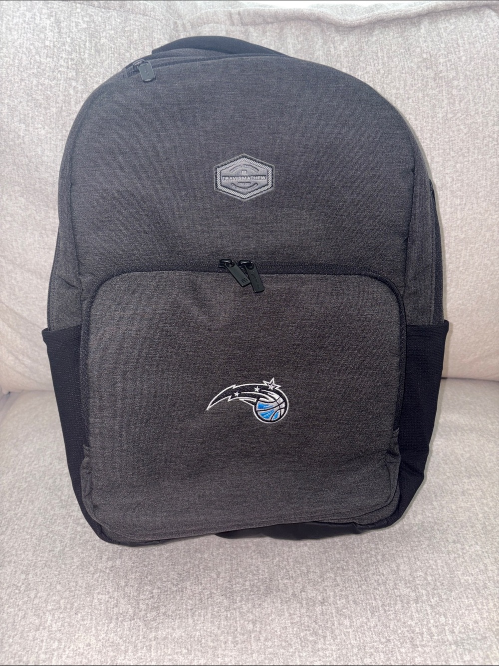 Travis Mathew Backpack with Embroidered Orlando Magic Logo